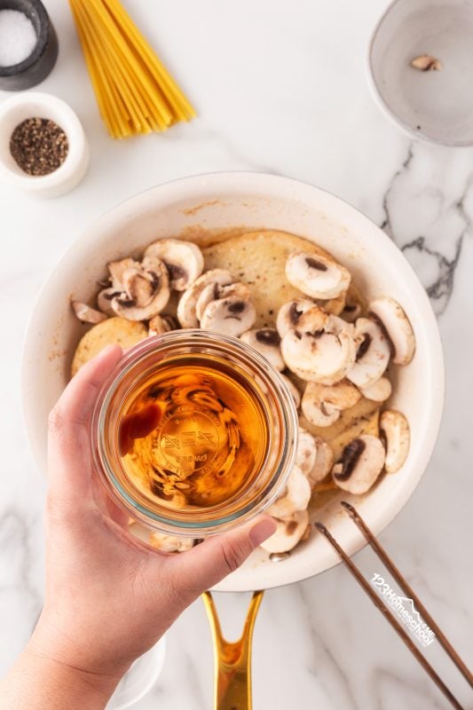 Pour marsala wine & sherry over top.