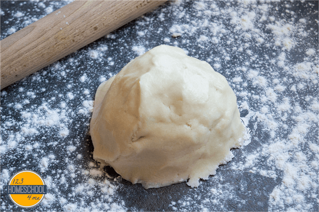 roll out sugar cookies on powdered sugar sprinkled counter roll out sugar cookies on powdered sugar sprinkled counter