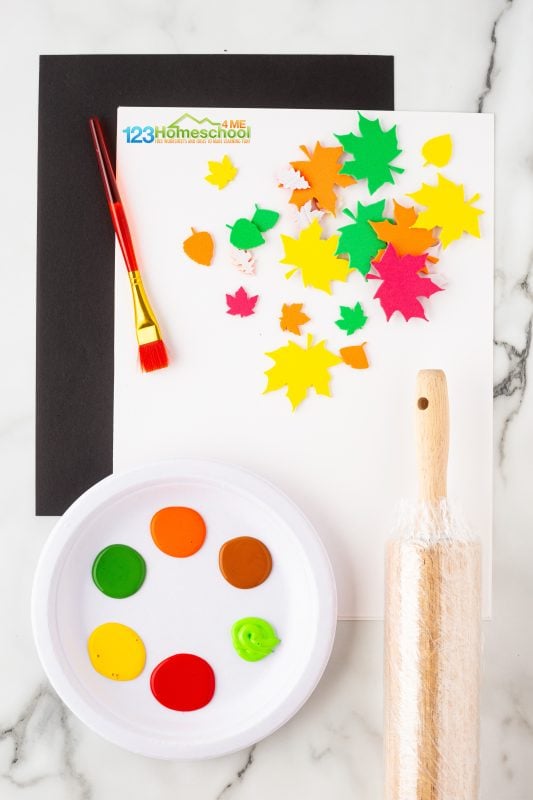 leaf sticker craft All you need to try this fun preschool leaf art project are a few simple materials: rolling pin plastic wrap foam leaf stickers paint brush acryllic paint in fall colors white paper (we like cardstock best)