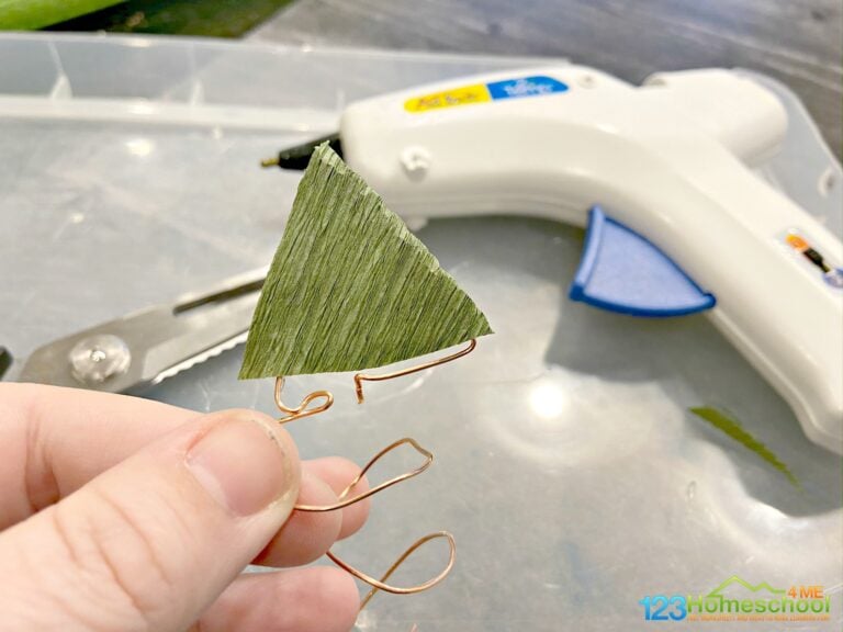 Kids are going to flip when they make they make their own spinning Christmas tree science project. This easy electronics project is perfect for December because it combines a Christmas craft and a Christmas science experiment to make one EPIC Christmas STEM project for kinderarten, first grade, 2nd grade, 3rd grade, 4th grade, 5th grade, 6th grade, 7th grade, and 8th grade students. This festive, holiday Christmas activity for kids is a must try this year!