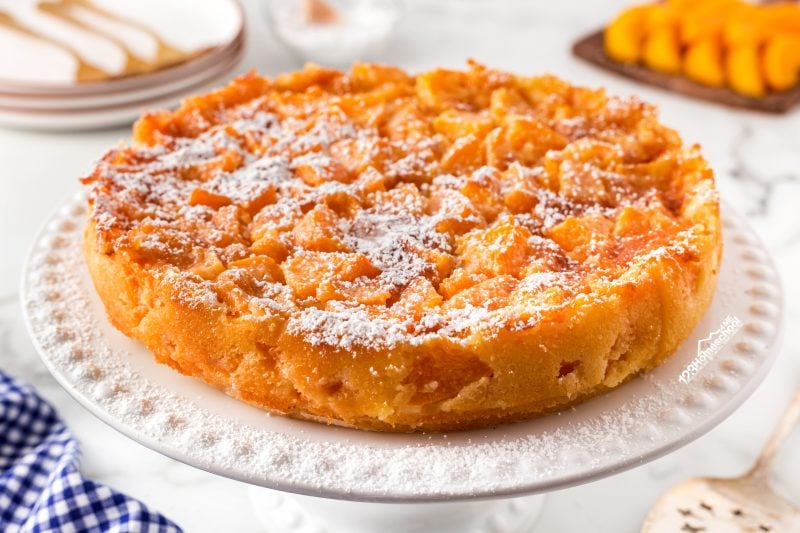 Celebrate summer with a delicious Peaches and Cream Cake recipe for a burst of sweet, summery flavor in every bite!
