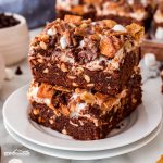 Get ready to indulge in Rocky Road Brownies, a decadent twist on classic brownies topped with marshmallows, chocolate, and grahams for a delicious s'mores experience!