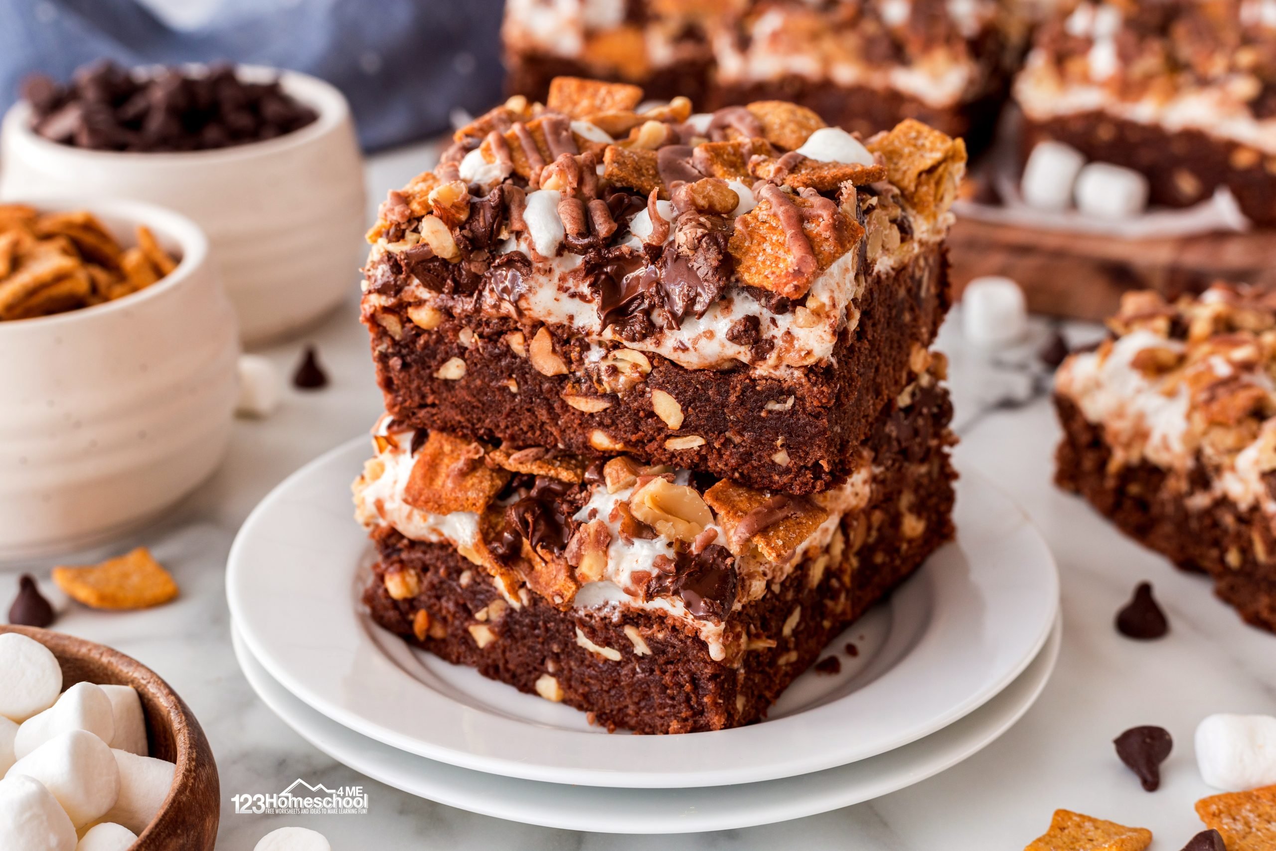 Get ready to indulge in Rocky Road Brownies, a decadent twist on classic brownies topped with marshmallows, chocolate, and grahams for a delicious s'mores experience!