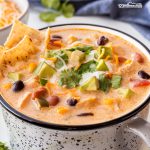 Discover your new favorite soup with this flavorful creamy chicken tortilla recipe that's packed with spices and deliciousness!