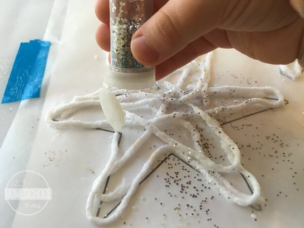 Sticky Yarn Snowflake Craft For Kids Sticky Yarn Snowflake Craft For Kids