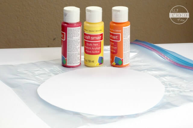 You'll need cardstock, ziplock bags, red/yellow/orange acrylic paint, glue stick, paint brush, and blue paper. You'll need cardstock, ziplock bags, red/yellow/orange acrylic paint, glue stick, paint brush, and blue paper.