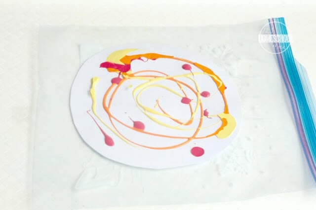You'll need cardstock, ziplock bags, red/yellow/orange acrylic paint, glue stick, paint brush, and blue paper. You'll need cardstock, ziplock bags, red/yellow/orange acrylic paint, glue stick, paint brush, and blue paper.