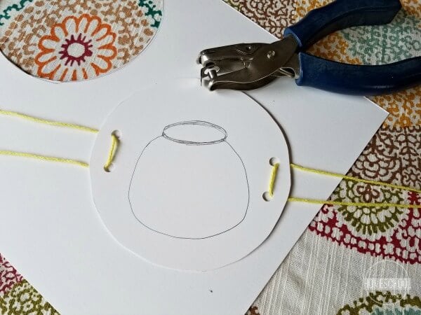 using a hole punch and string make these handles using a hole punch and string make these handles