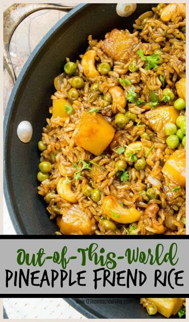 Pineapple Fried Rice - you are gong to love this out-of-this-world rice recipe! It is easy to make, super yummy, hearty, and full of healthy ingredients! This makes a great one dish lunch or side dish. out-of-this-world-pineapple-rice-compressed