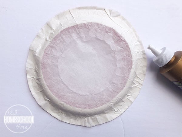 glue the coffee filter to the red apple plate frame you created glue the coffee filter to the red apple plate frame you created