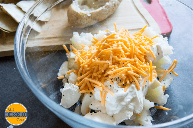 mix the potato with cream cheese, sour cream cheddar cheese, salt and pepper mix the potato with cream cheese, sour cream cheddar cheese, salt and pepper