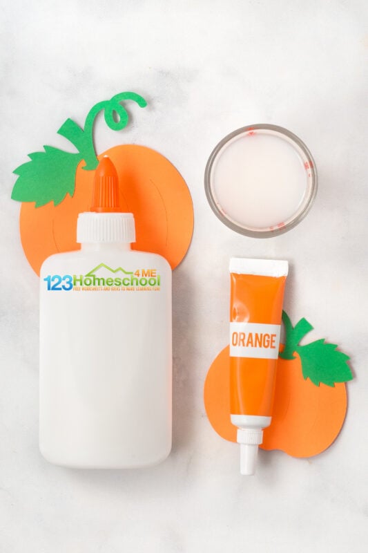 4 oz of white school glue orange food coloring 2 oz of sta flo liquid starch Optional: beads, googly eyes, green pipe cleaner