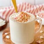 I love warming up to a cup of hot cocoa in the winter! But we've moved away from the store bought mixes that are filled with artifiical ingredients, chemicals, and preservatives. Instead we whip up a batch of this simple homemade white hot chocolate recipe. This is so easy to make with convenient chocolate chips! You will love that this creamy hot chocolate is all grown up with white cocoa and a touch of cinnamon.