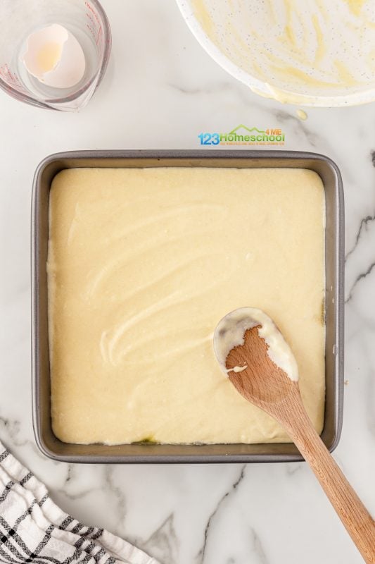 spread pineapple cake evenly to cover bottom layer