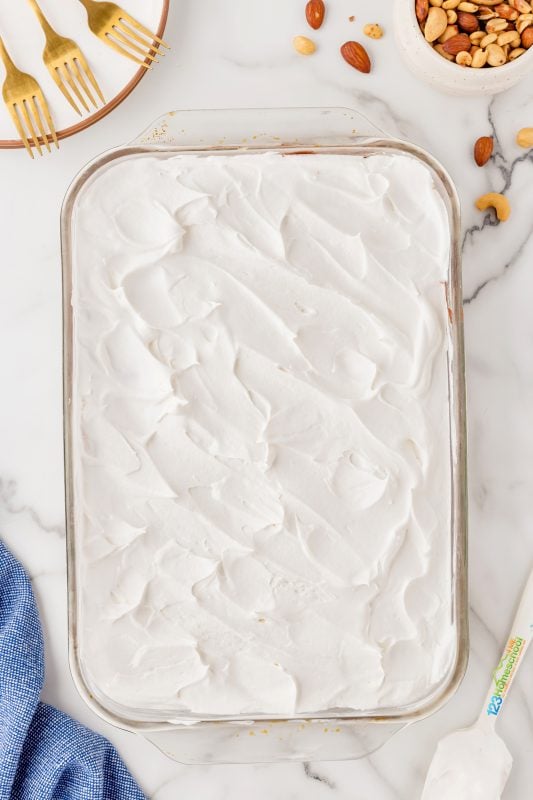 Let the layered dessert chill in the fridge until it’s time to serve! spread top cool whip layer