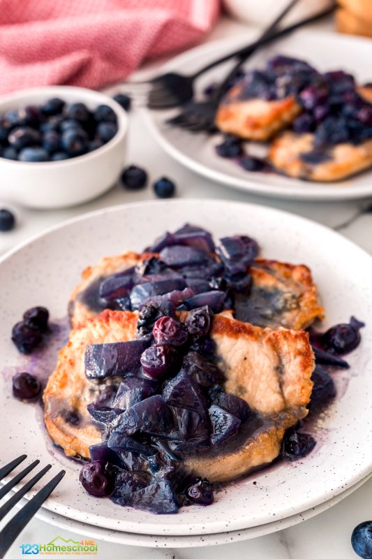 Serve pork chops with a scoop of blueberry sauce over the top. This not only enhances the flavor of the pork, but makes them super juice and tender too! I like to serve my blueberry pork chops with green beans and quinoa. Pork Chops Recipe