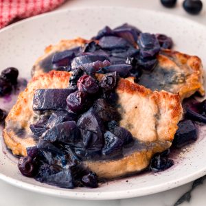 Elevate your dinner this summer with easy and delicious blueberry pork chops that offer a fresh twist!
