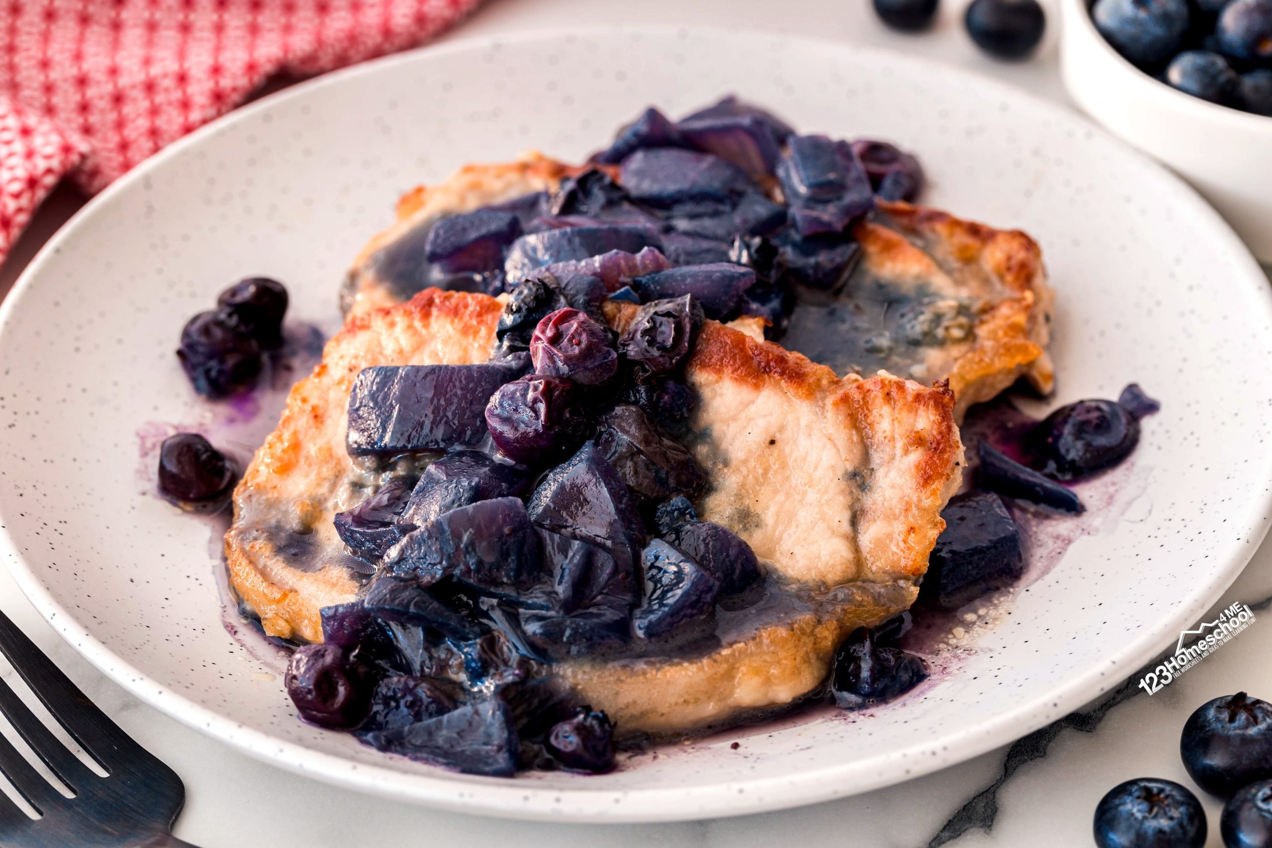 Elevate your dinner this summer with easy and delicious blueberry pork chops that offer a fresh twist!