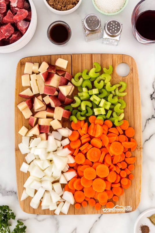 beef stew crockpot Start by prepping your veggies: peel those fresh carrots and potatoes, then chop up the onion, carrots, potatoes, and celery.