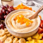 Elevate your fruit tray with this heavenly peaches and cream fruit dip—an outrageously delicious blend of cream cheese and marshmallow fluff!