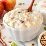 Try our delightful Autumn Apple Salad, a delicious jello side dish featuring lemon jello, pineapple, cream cheese, cool whip, and nuts—perfect for fall or any meal!