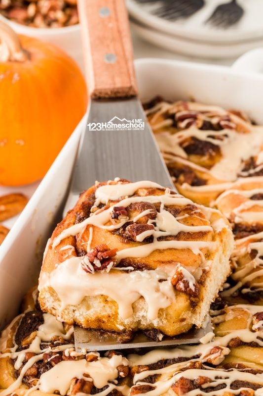 Gently lift those pumpkin-filled cinnamon rolls out of the pan and serve them warm! Trust me, they are absolutely divine! Each bite is a delightful taste of fall, making your taste buds dance with joy!
