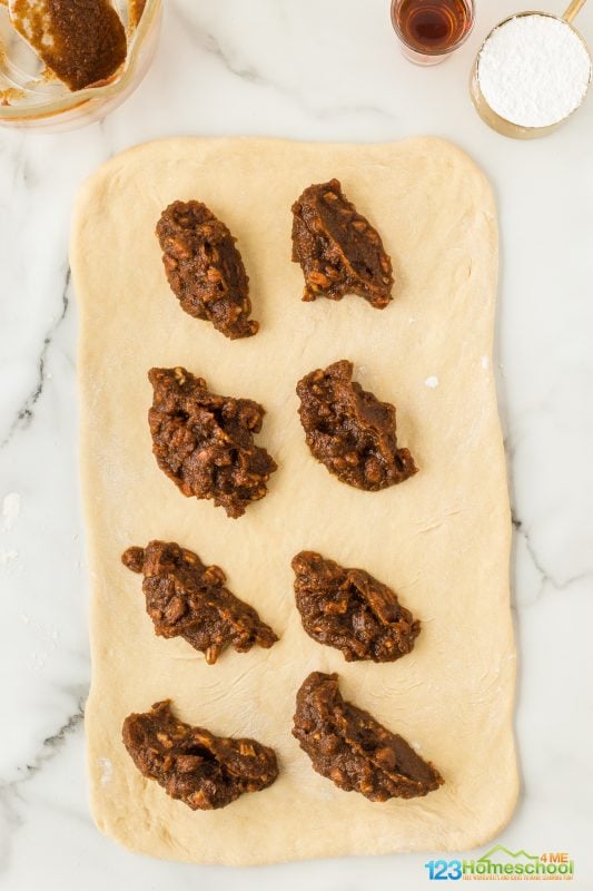 Next, evenly spread the pumpkin mixture over the rolled-out dough, making sure to reach all the edges! 