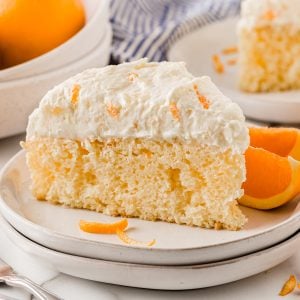 Try our Sunshine cake for the perfect summer dessert— it is made with a yellow cake mix, pineapple and a dreamy orange, pineapple, and vanilla pudding frosting!