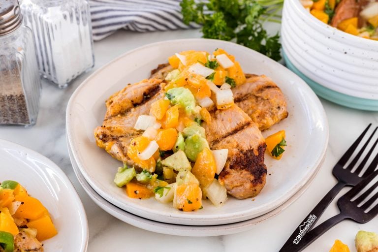 Elevate your summer dinners with our delicious Pork Chops with Peach Salsa, a quick and satisfying meal that the whole family will love!
