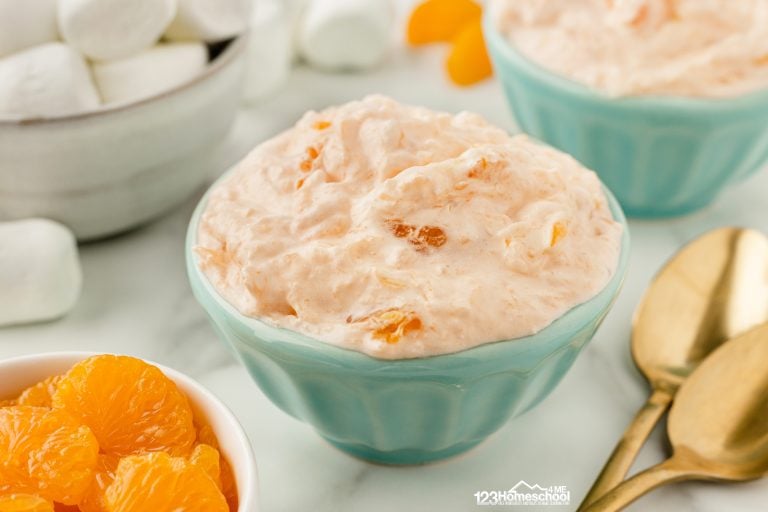 Looking for a quick, easy side dish? Try this delicious orange jello salad with pineapple, mandarin oranges, marshmallows, and cool whip - Yum!