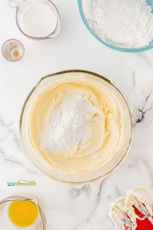 Mix in the flour mixture alternating with 3/4 cup of milk, stirring gently until everything is just combined! yellow cake from scratch