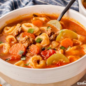 Fall in love with this quick and easy cheesy tortellini soup with sausage and Italian flavors that your family will devour!