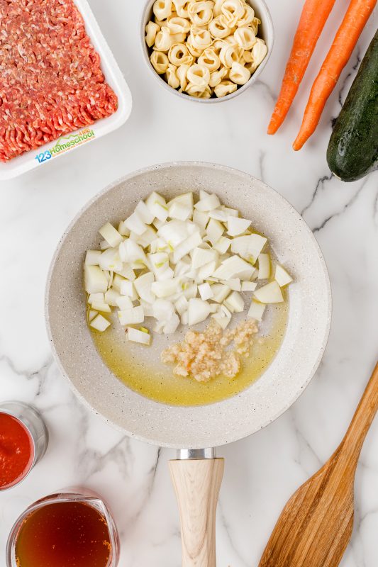 saute onion and garlic in olive oil saute onion and garlic in olive oil