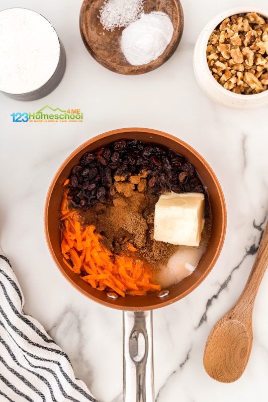 in a saucepan mix together First, preheat your oven to 325°F and lightly grease a 9x13 inch baking pan.
In a small saucepan, combine the following ingredients: sugar, grated carrots, your favorite spices, plump raisins, water, fresh orange juice, and a bit of butter. Bring this delightful mixture to a boil, then reduce the heat and let it simmer for 5 minutes, allowing those flavors to meld beautifully.