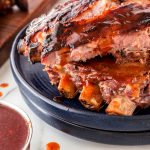 Elevate your BBQ game with these mouth-watering Root Beer Ribs that are tender, tangy, and infused with a delicious root beer barbecue sauce!