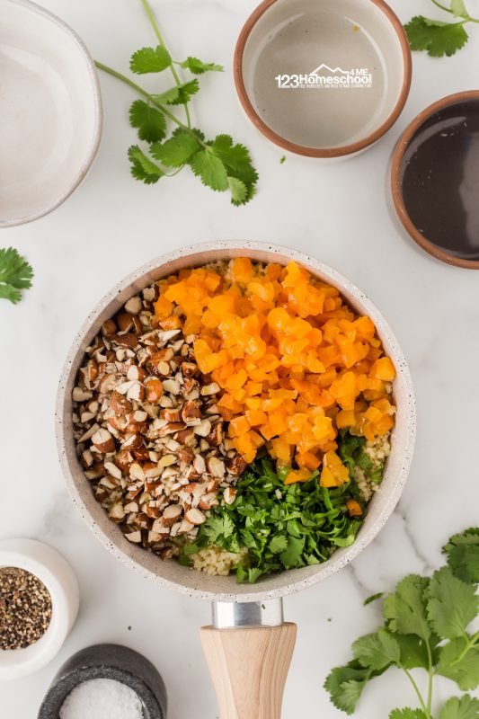 add in dried apricots almonds cilantro Mix in the oil, dried apricots, almonds, and 1/4 cup of fresh cilantro. Cover the mixture to keep it warm while you fire up the grill for the chicken!