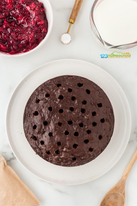 make holes in the cake Once your cakes and sauce have cooled down, use the handle of a wooden spoon to gently poke holes all over the cakes. This step helps all the delicious flavors soak in!