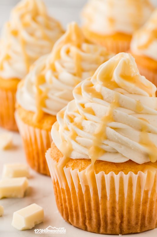 These cupcakes are a true delight! At first glance, their all-white appearance is simple and understated. But don't be fooled! One bite and you'll be amazed by the burst of flavor in these incredibly moist treats! Wedding cupcake