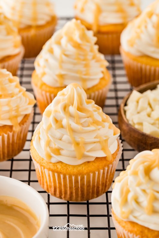 For a stunning finish, pipe the meringue buttercream high with your piping bag, and drizzle some caramelized white chocolate on top for that extra touch of sweetness! cupcake white icing