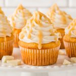 Indulge in these heavenly white chocolate almond cupcakes topped with luscious Swiss Meringue Buttercream, perfect for any occasion!