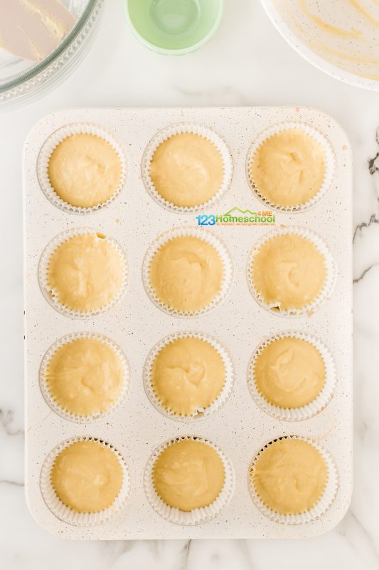 fill cupcake liners 2-3 full with batter Distribute the batter evenly among 12 cupcake liners and bake for 15-18 minutes. They’re ready when you gently press the tops and they spring back!