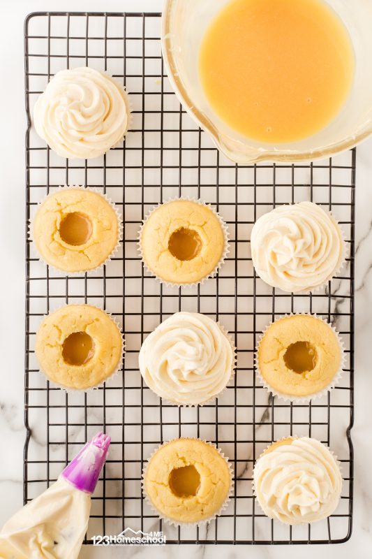 frost cupcakes To whip up this delicious meringue, start by combining sugar, cream of tartar, vanilla extract, and egg whites in a large mixing bowl. Set the bowl over a saucepan filled with simmering water (or use a double boiler if you have one handy).
Now, whisk continuously until the sugar dissolves and the egg whites warm up to 160°F—this should take about 4-6 minutes. Once heated, remove from the heat.
Next, switch to the whisk attachment and beat the mixture on low speed. Gradually increase to high speed and keep mixing until stiff, glossy peaks form—this will take about 5 to 7 minutes.
For a stunning finish, pipe the meringue buttercream high with your piping bag, and drizzle some caramelized white chocolate on top for that extra touch of sweetness!