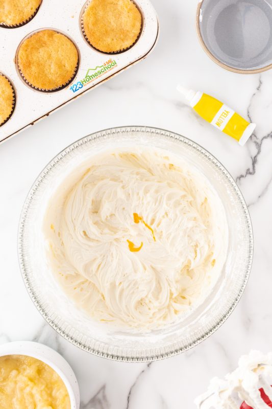 dole whip frosting In an electric mixer or using a hand mixer in a large bowl, combine pineapple juice, soft butter, and vanilla extract. Gradually add sugar to achieve a smooth consistency. If the mixture feels too wet, simply add a little extra sugar; if it’s too dry, mix in a tablespoon of milk to achieve the perfect texture.
For a fun twist, you can add a few drops of yellow food coloring to give it a beautiful pastel hue!