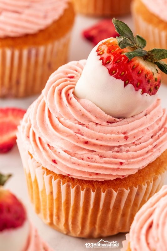 summer cupcakes Want to truly wow your guests? Consider topping your frosted cupcakes with a decadent white chocolate-covered strawberry! It’s a simple yet stunning finishing touch that’s sure to impress!
**Tip:** Making white chocolate-covered strawberries is super easy! Just melt white chocolate following the package instructions, dip your fresh strawberries into the luscious mixture, and place them on parchment paper to let the chocolate set.