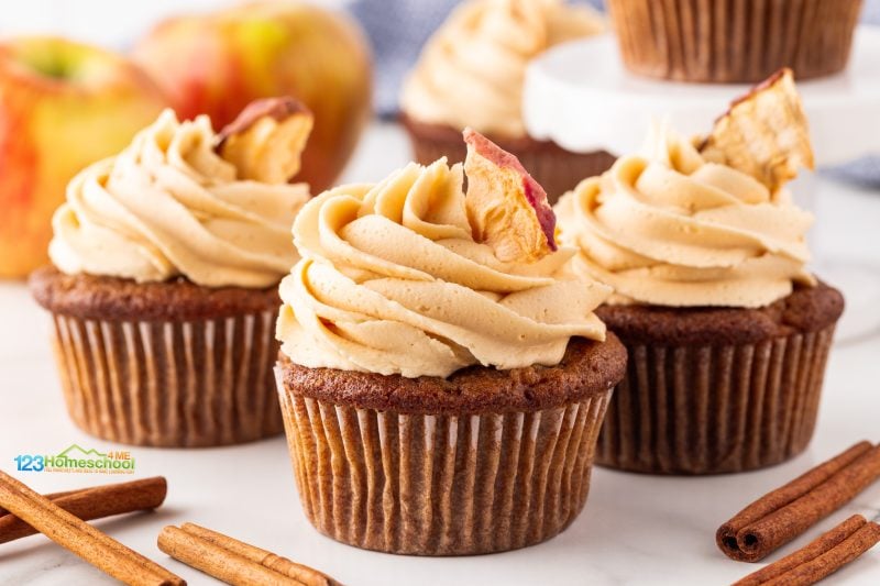 Savor the flavors of fall with delicious apple cupcakes topped with caramel icing, featuring a perfect blend of cinnamon and spice!