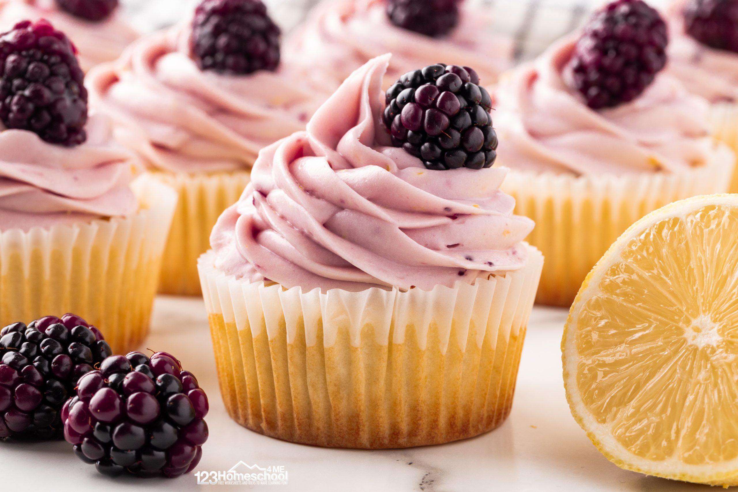 Try these homemade lemon cupcakes topped with delicious blackberry frosting for a perfect fruity summer dessert!