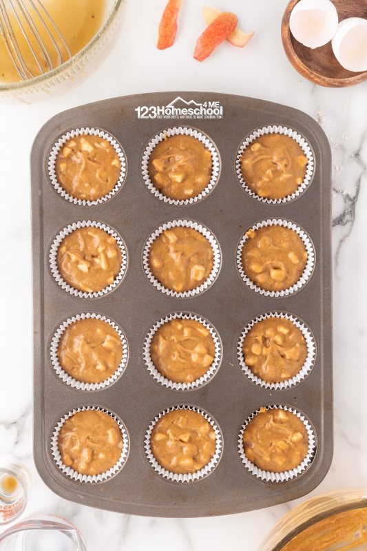 apple muffins First, fill the cupcake liners about 3/4 full with your batter. Bake them in a preheated oven for 21 to 23 minutes, and don’t forget to rotate the pan halfway through for even baking! When they’re done, a toothpick inserted into the center should come out clean.
Once they're baked to perfection, remove them from the oven and let them cool completely before frosting.