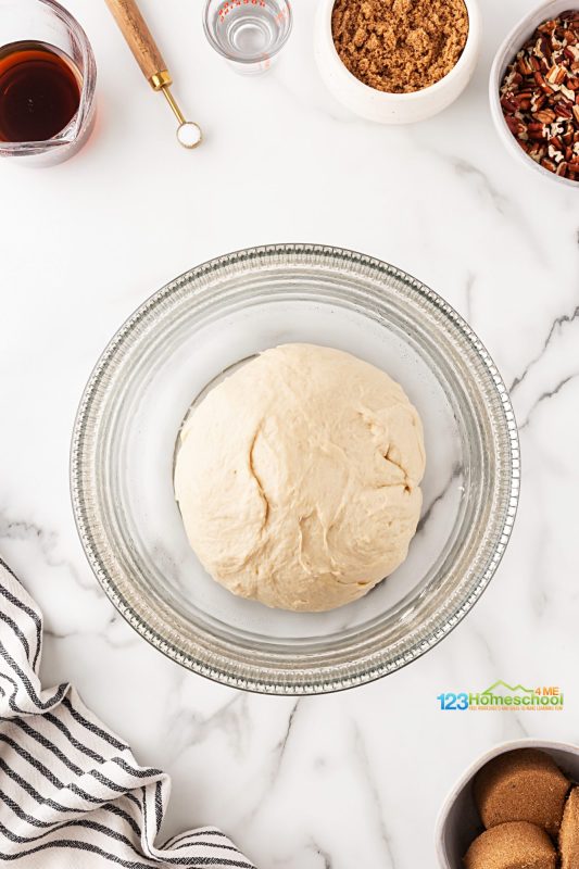 allow dough to rise Now you can either make the yeast rolls by hand or in a bread machine. If you use a bread machine, simply put the ingredients in your bread machine and select dough. In a couple hours you will have perfeclty mixed, fluffy dough that has risen to perfection.