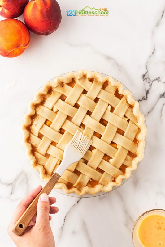 brush egg wash on pie crust For a nice golden finish, brush the lattice with a beaten egg. If you like a little sparkle, sprinkle some sugar over the top!