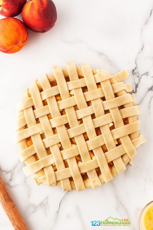 Repeat the process, alternating folding every other strip, until the entire pie is covered with a beautiful lattice pattern!